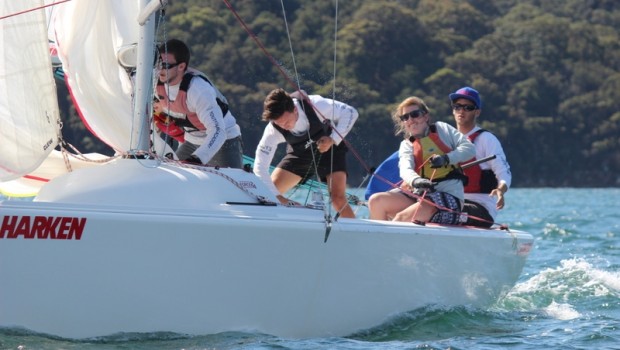 Oliver Hartas and crew working hard in the final flight. Photo by Damian Devine.