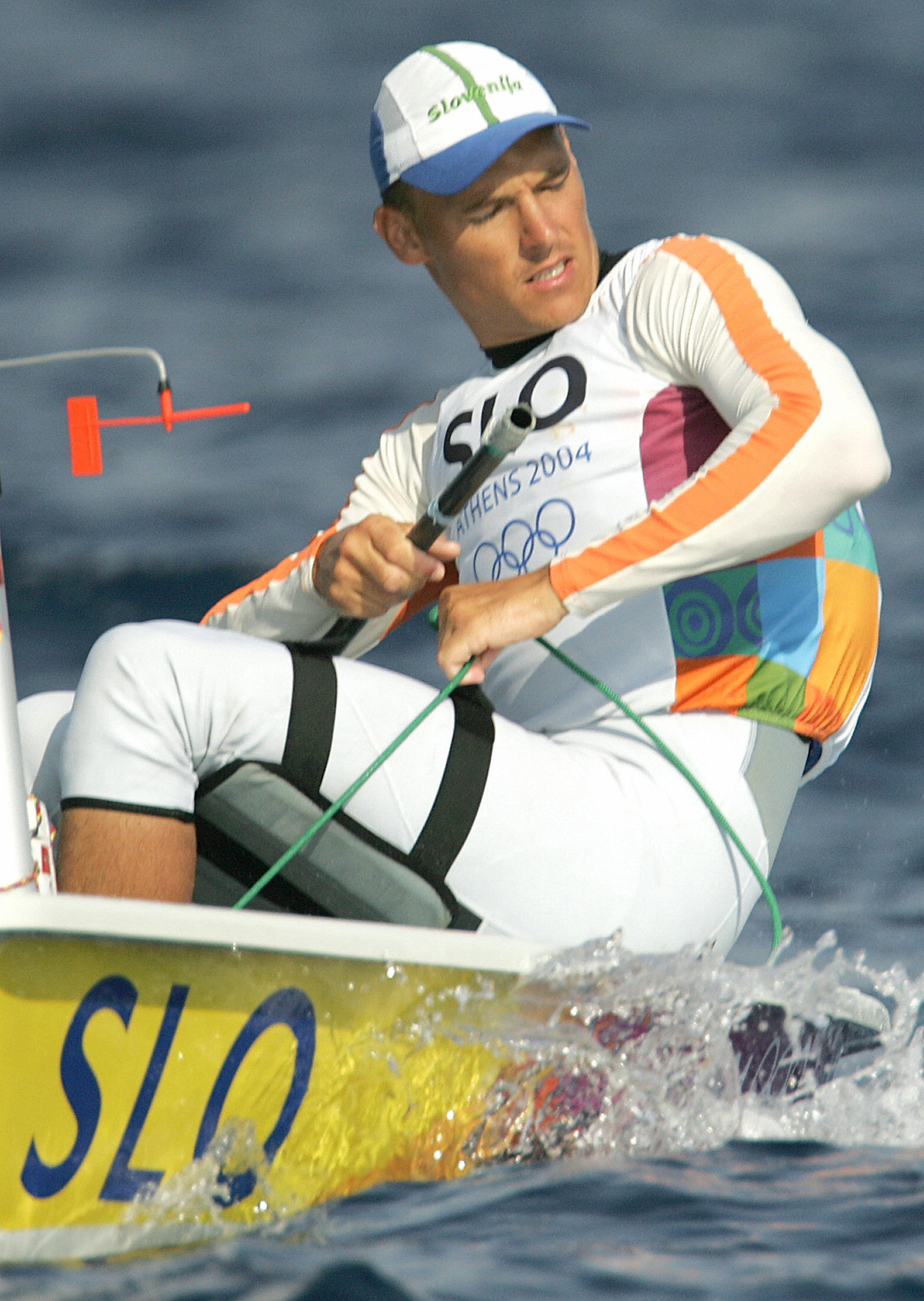 Athens, GREECE: Slovenia's Vasilij Zbogar races during the Men's Single-handed Dinghy-Laser class race Nine, 20 August 2004, on the seventh day of competition in the 2004 Olympic Games in Athens. AFP PHOTO / Menahem KAHANA (Photo credit should read MENAHEM KAHANA/AFP/Getty Images)