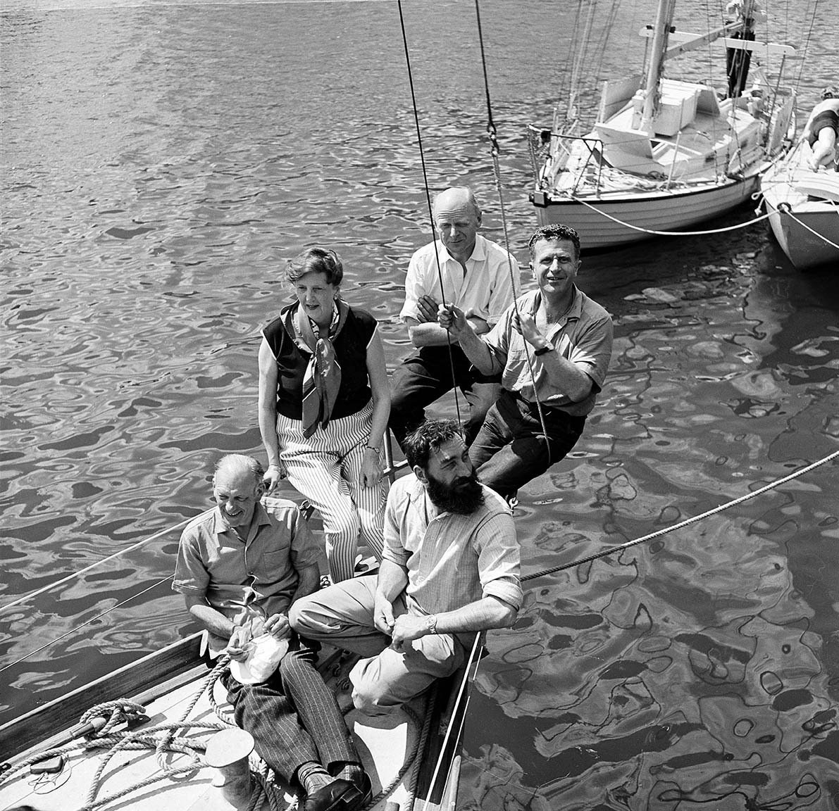 PICTURES OF YESTERYEAR - Managed by PPL - Copyright reserved Limited Edition Classic Boat fine art print: Circa 1960. 4 of the 5 skippers at the start of the first Observer singlehanded transatlantic race (OSTAR), Plymouth UK. Front: Francis Chichester, Val Howells, Sheila Chichester, Col 'Blondie' Haslar (bow) & Dr David Lewis. Frenchman Jean Lacombe arrived late for the start. PHOTO CREDIT: Eileen Ramsay/PPL Tel: +44(0)1243 555561 E.mail: ppl@mistral.co.uk Web: www.pplmedia.com *** Local Caption *** Circa 1960. 4 of the 5 skippers at the start of the first Observer singlehanded transatlantic race (OSTAR), Plymouth UK. Front: Francis Chichester, Val Howells, Sheila Chichester, Col 'Blondie' Haslar (bow) & Dr David Lewis. Frenchman Jean Lacombe arrived late for the start.