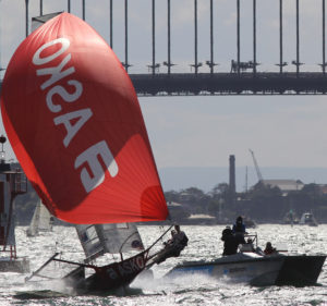 The Australian 18 Footers League's video team follow the flying Asko skiff on Sydney Harbour